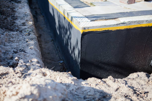 Professional Waterproofing technician working in New Richmond, OH